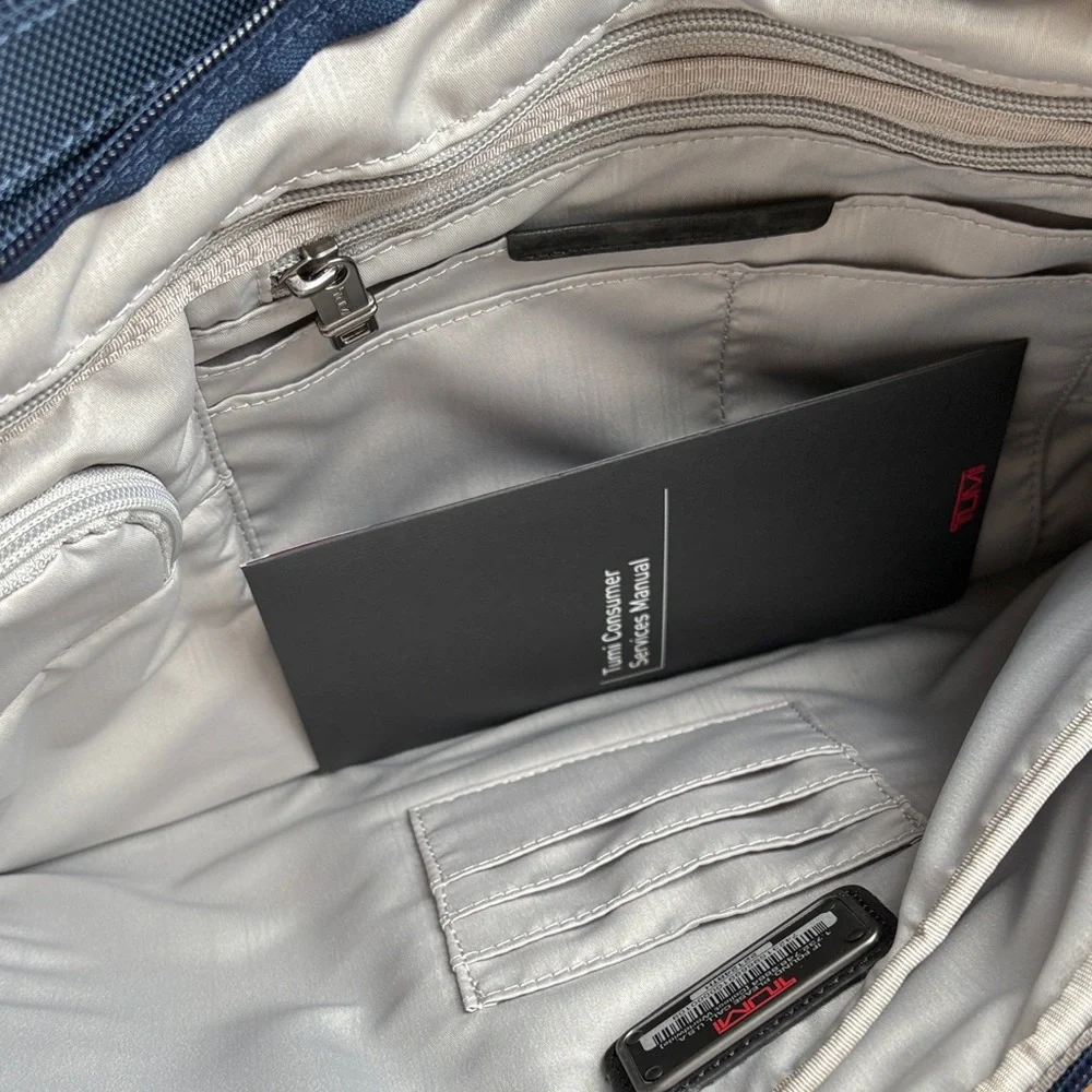 Tumi alpha deluxe carry on satchel in navy blue